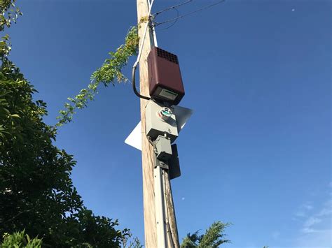 what is large metal box on telephone pole|mysterious boxes on poles.